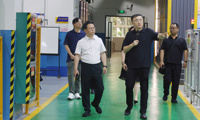 湖北开放大学调研组到我?？疾旖涣?校长甘金明参加座谈