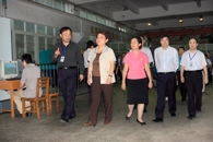 自治区副主席李康在区教育厅厅长高枫、副市长文和群陪同下到我院视察